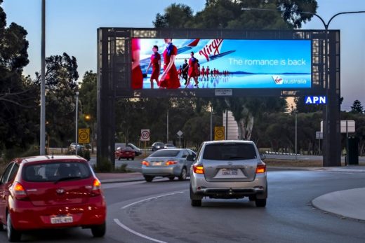 Outdoor Digital Billboard Which Recognizes Make and Model of Passing Cars